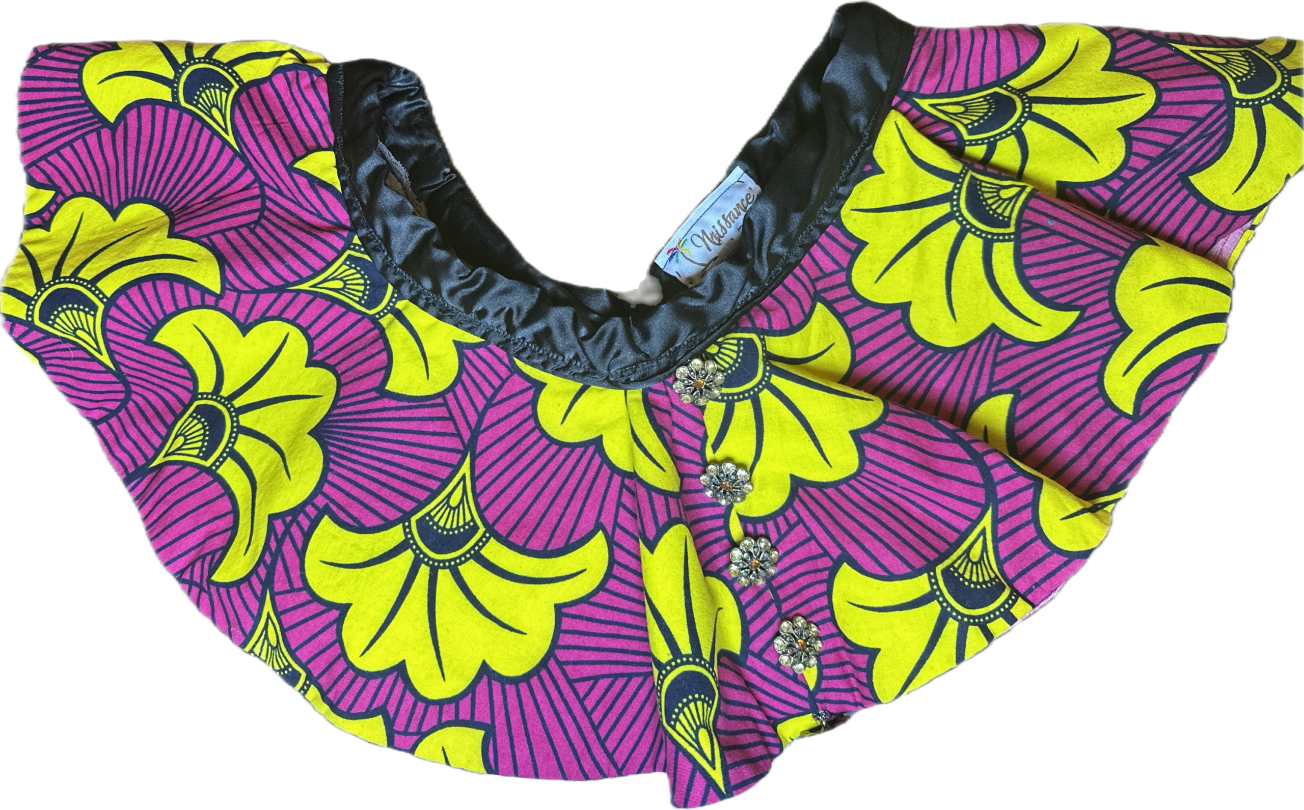High angle view of peplum belt with a floral design on a flat surface